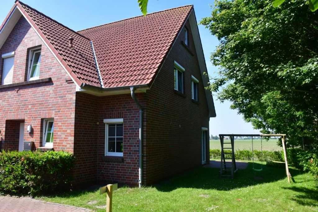 Ferienhaus Carolinenwind Carolinensiel Exterior foto